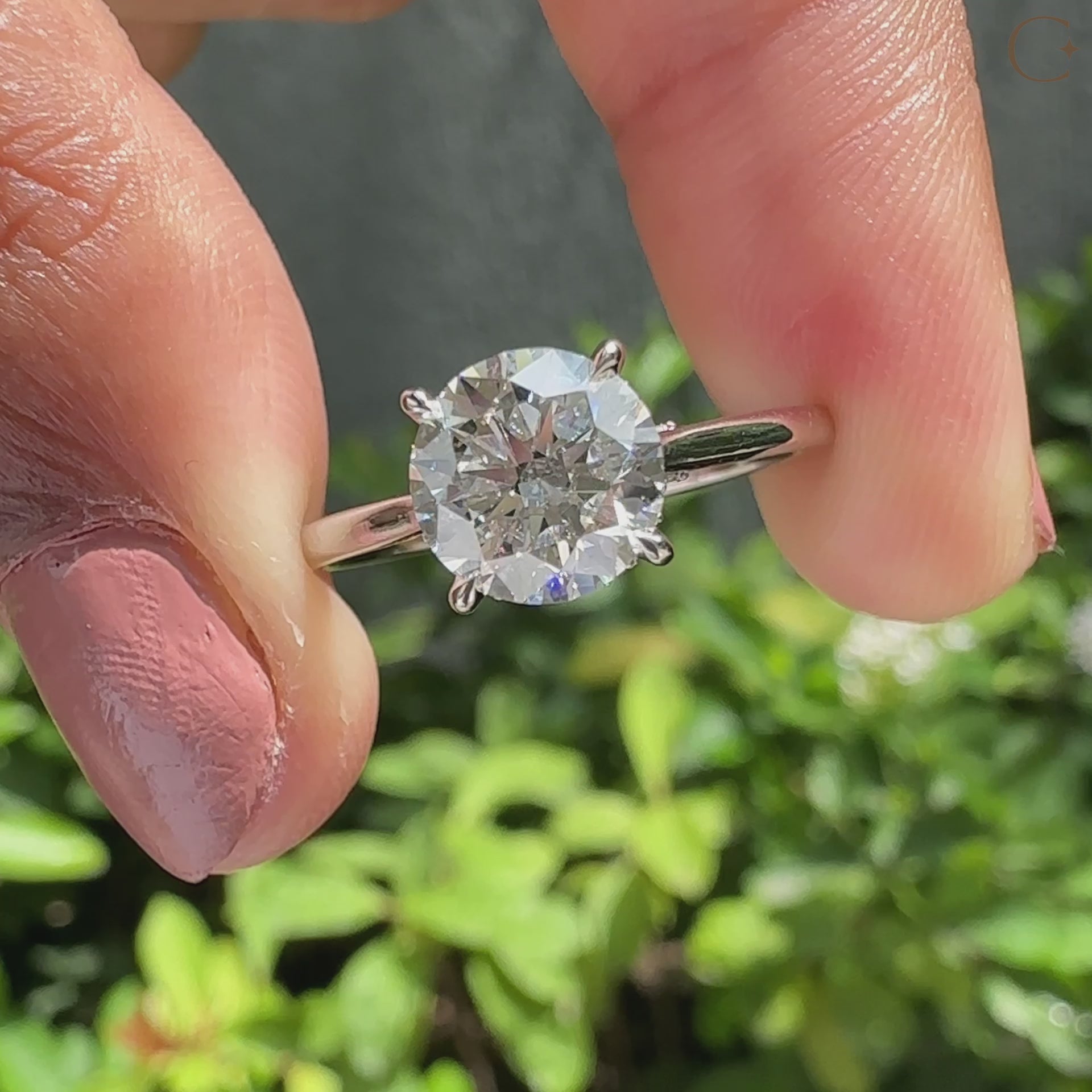 Cathedral diamond ring with tapered shank ring.