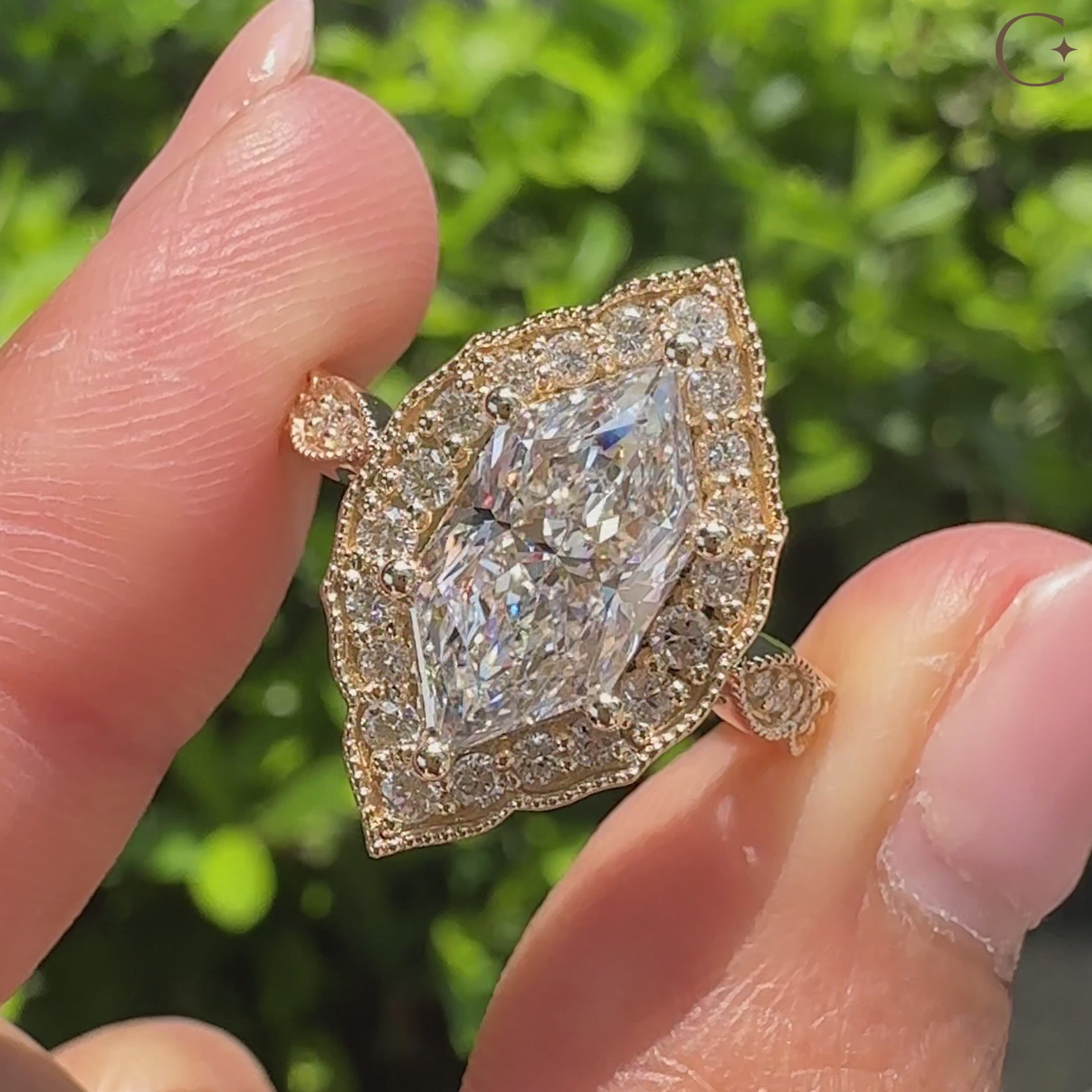 Vintage style dutch marquise ring with round side stones.
