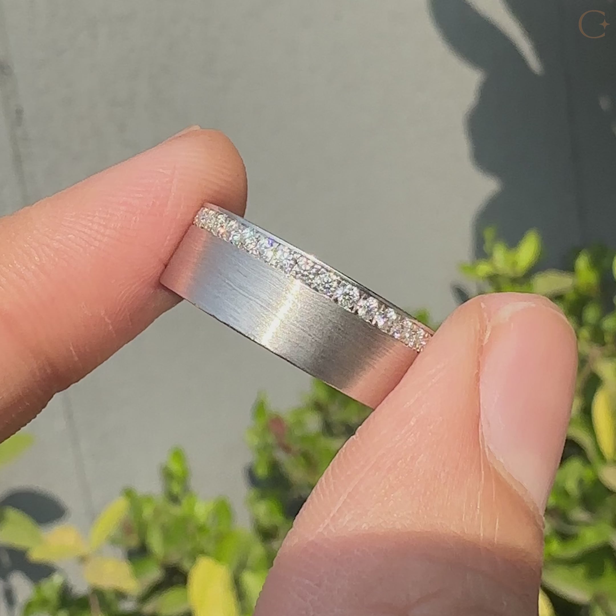 Handmade men’s round cut ring with hidden pave detail.
