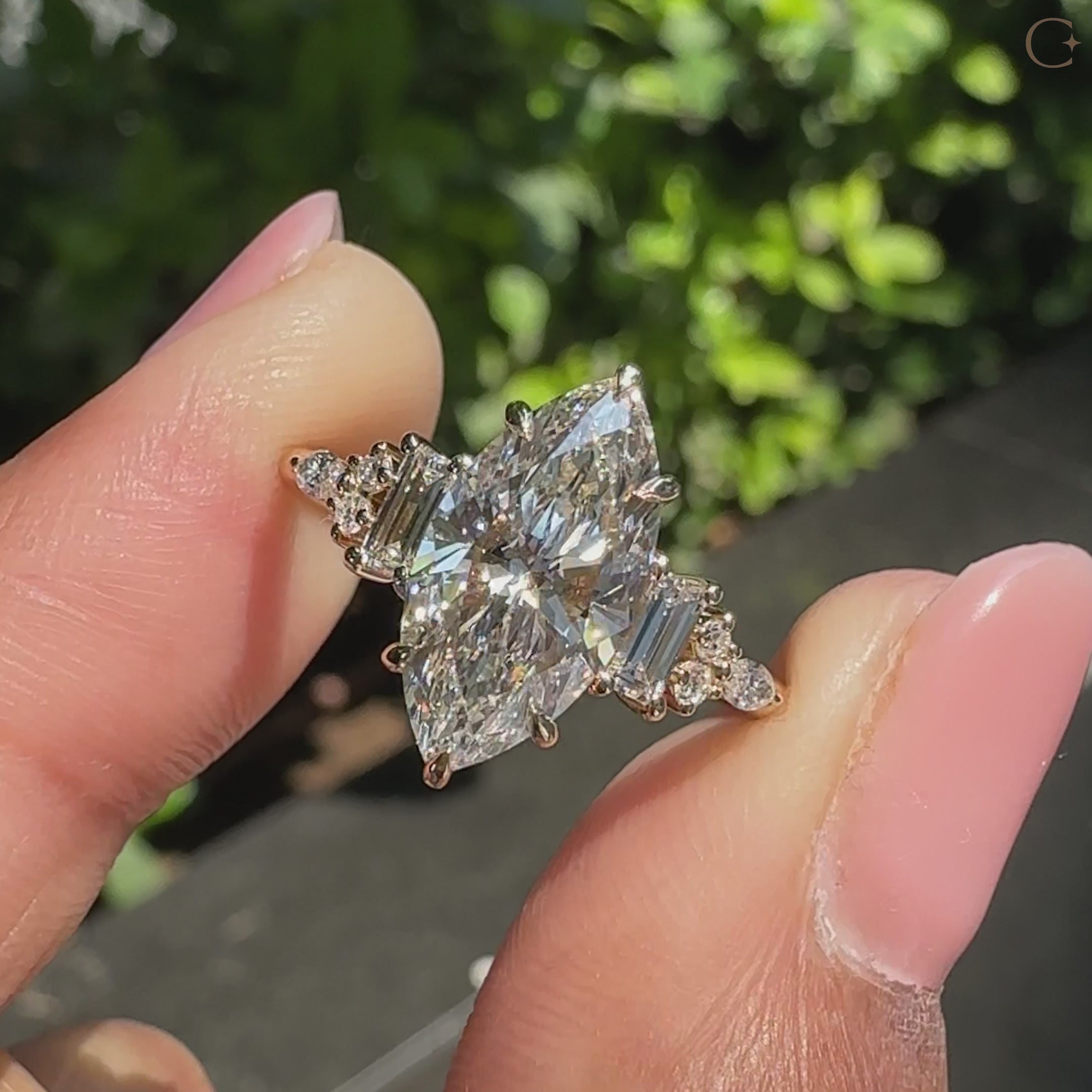 Lab grown marquise cut engagement ring in muse setting.
