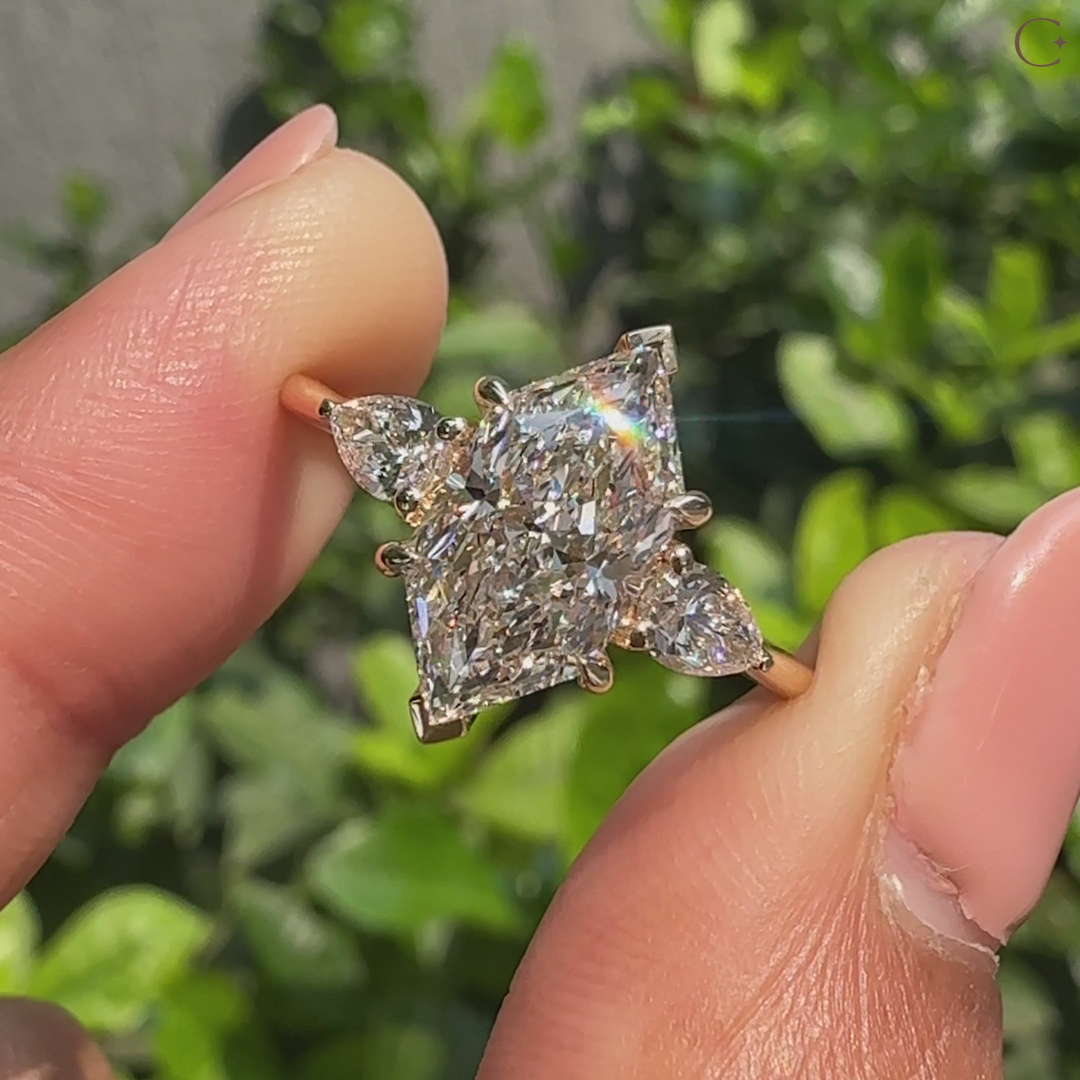 Dutch marquise diamond three stone engagement ring
