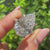 Pear cut center diamond with marquise and round pave
