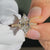 Vintage inspired engagement ring with dutch marquise diamond and milgrain detailing