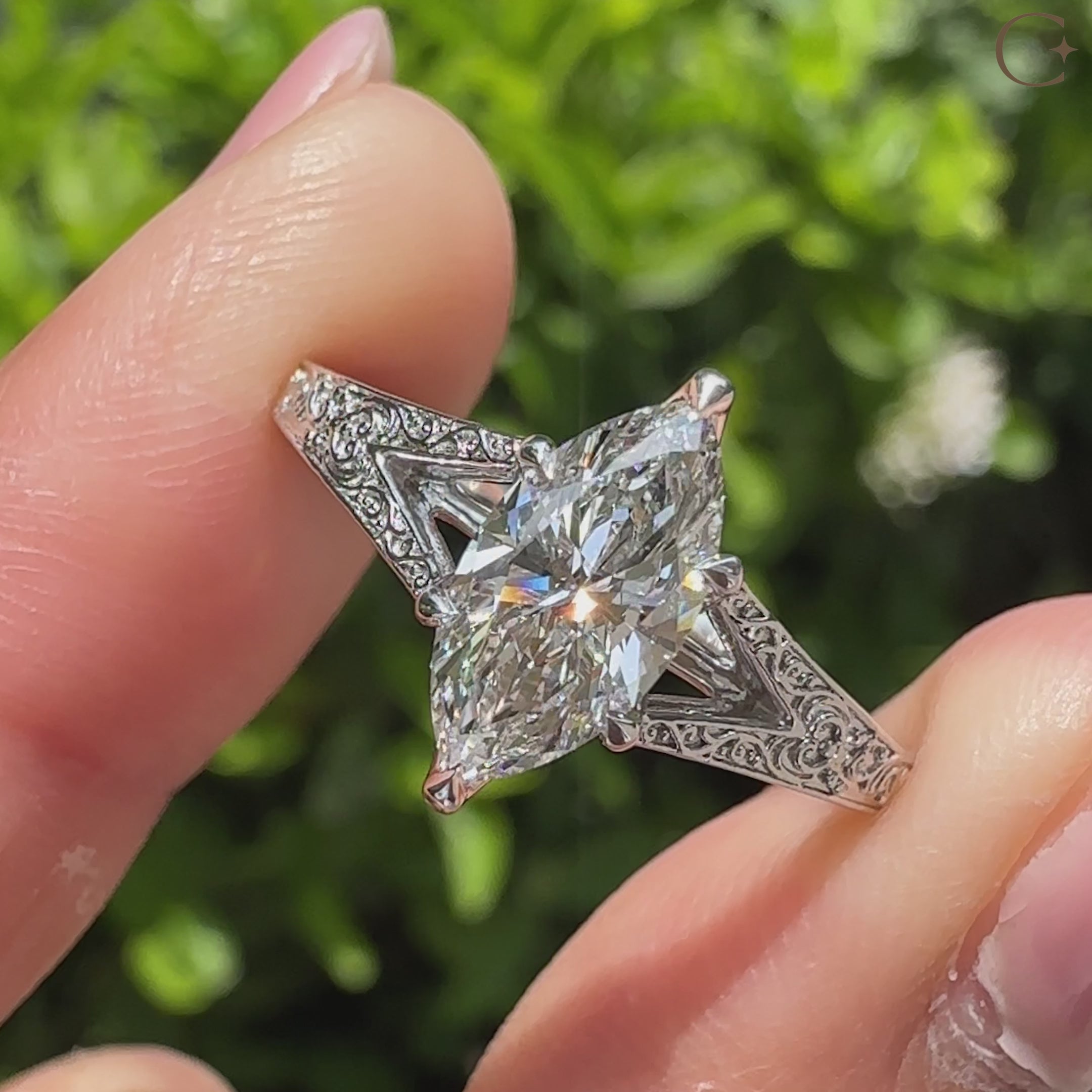 Vintage marquise diamond ring with filigree and tulip setting.
