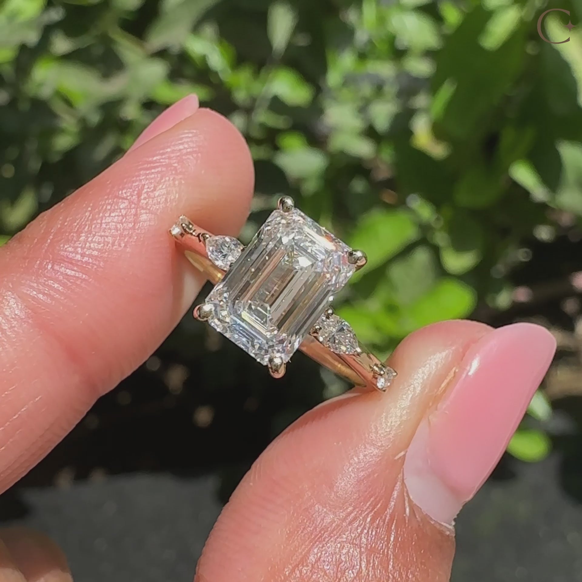 A Lab Grown Diamond in a distance pave setting ring crafted in yellow gold with an IGI certified marquise and round cut stone.

