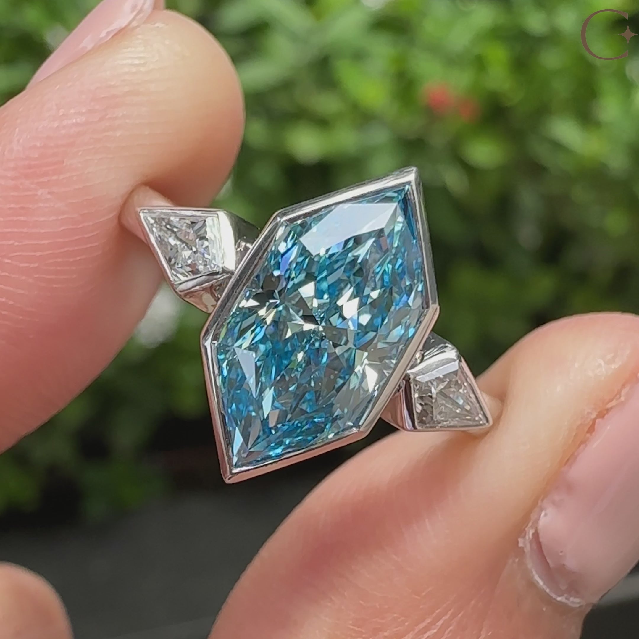 Blue dutch marquise center diamond with kite side stones
