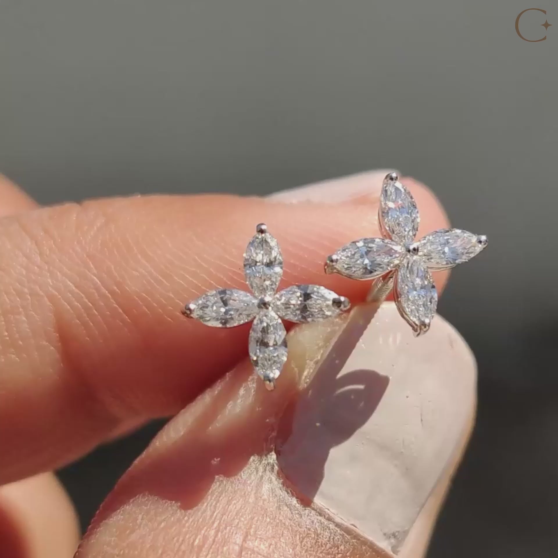 Flower stud earrings with lab grown diamonds.