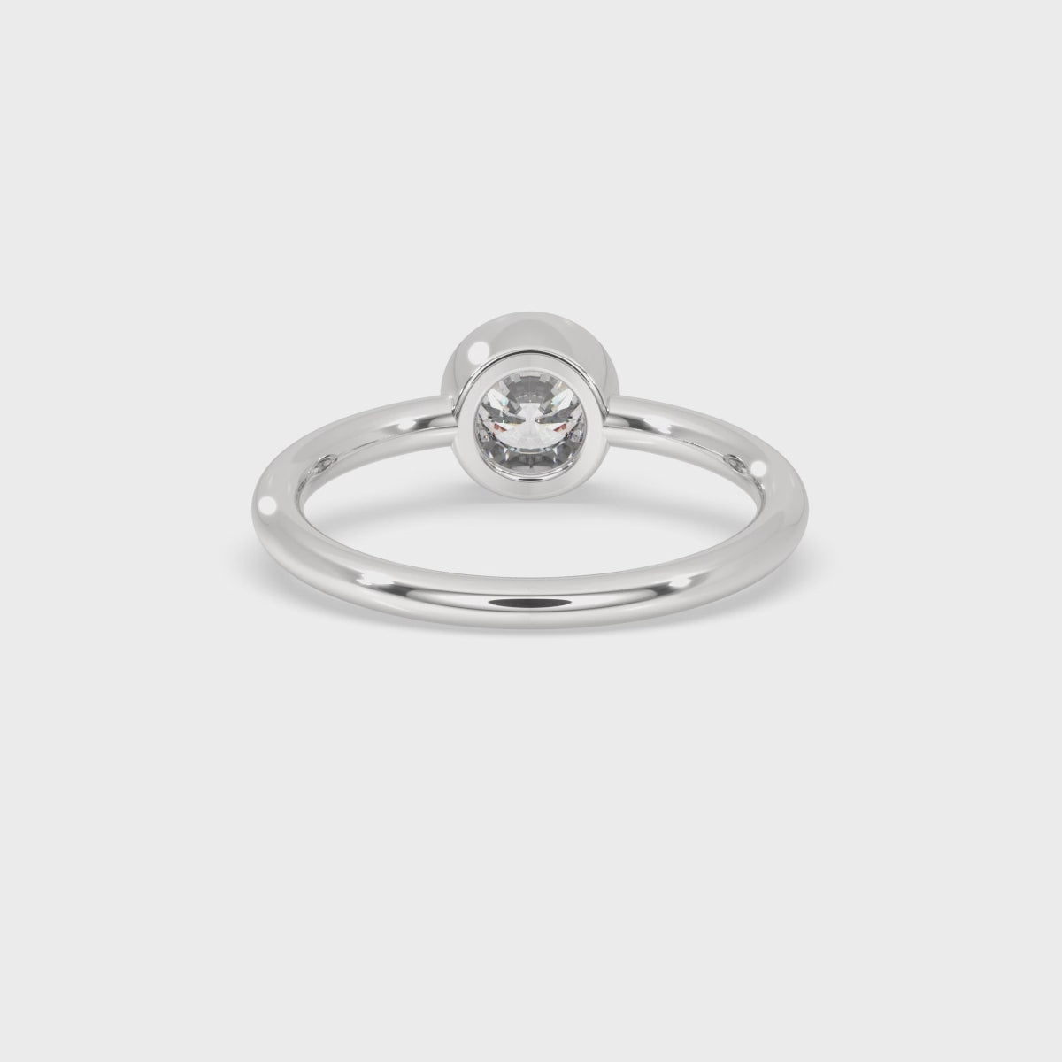 Gold Solitaire Engagement Ring With Elegant Bezel Setting