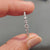 Elegant round diamond band in white gold.
