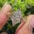 Art deco marquise engagement ring with milgrain pave details
