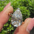 Pear cut lab grown diamond ring with V prong setting.

