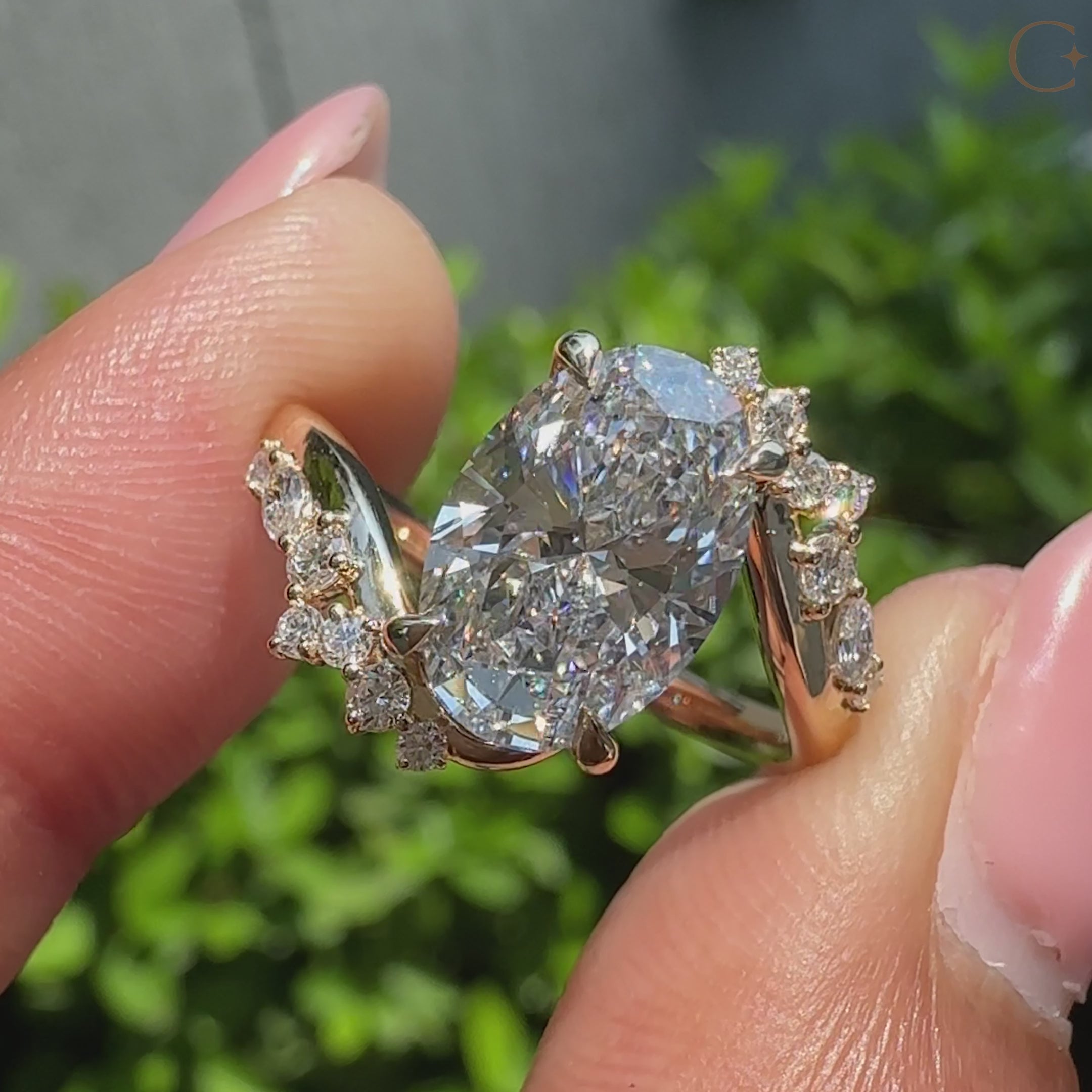 Open gallery oval diamond ring with bypass setting.
