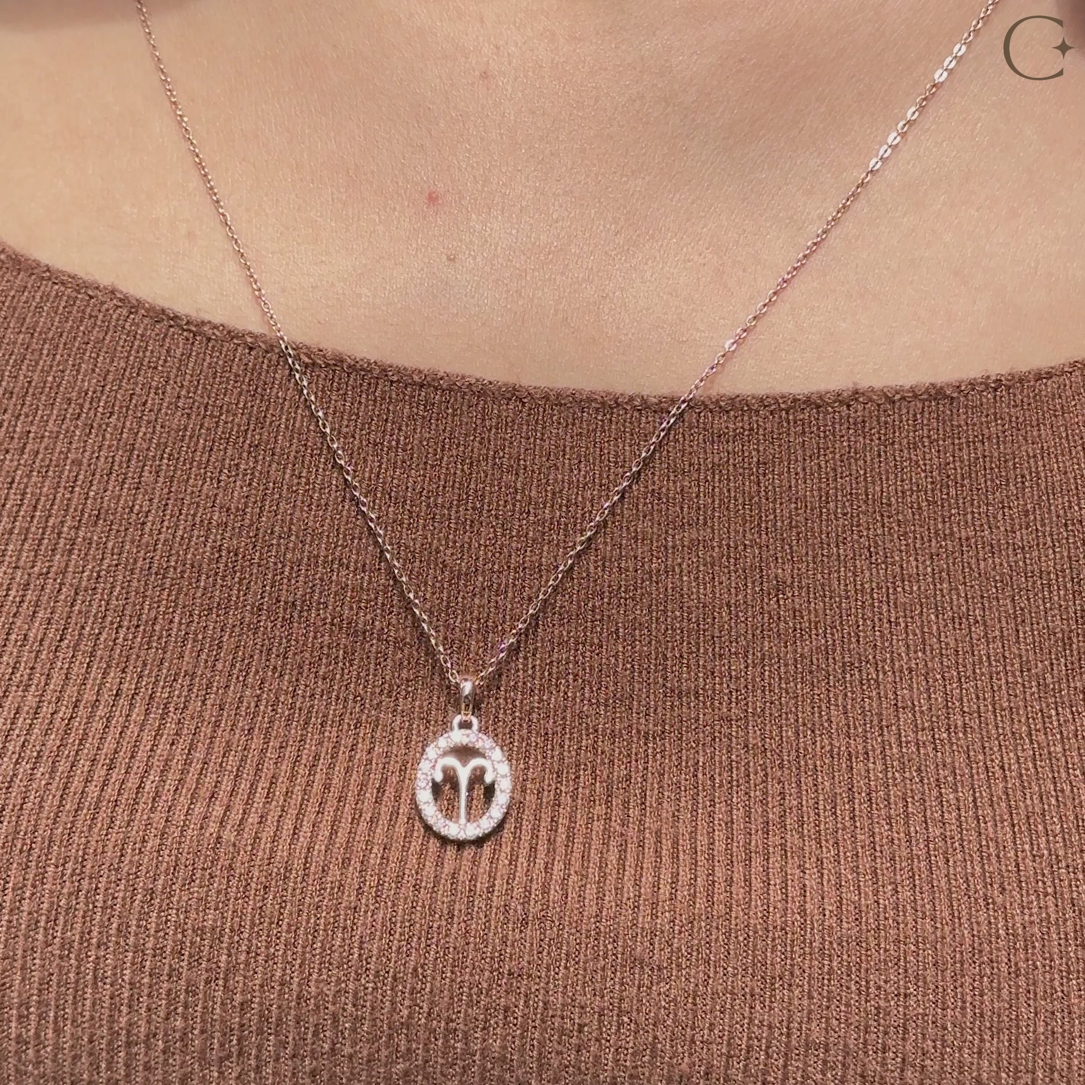 Handmade Aries pendant in rose gold with halo diamond design.