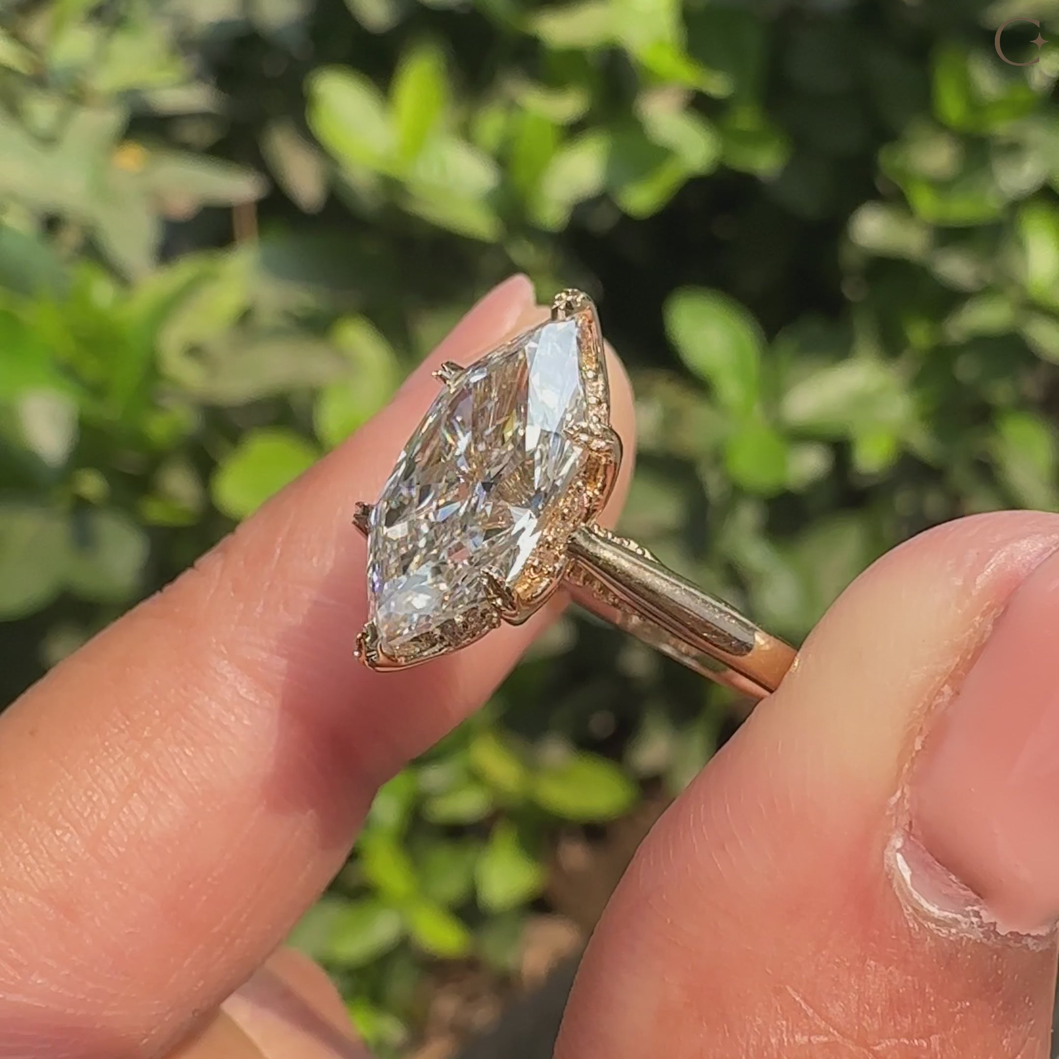 Lab grown dutch marquise ring with filigree bridge design.
