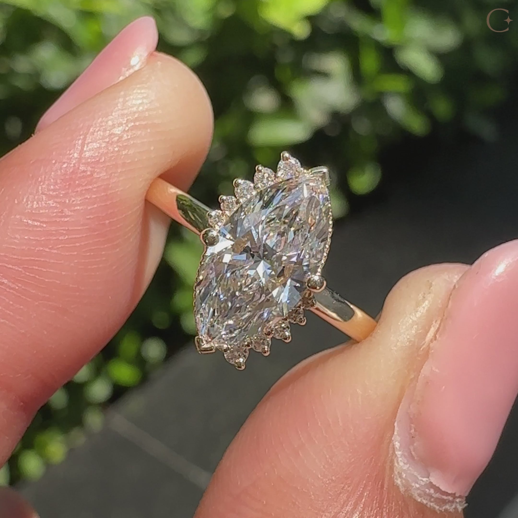Lab grown marquise cut diamond ring with milgrain details.
