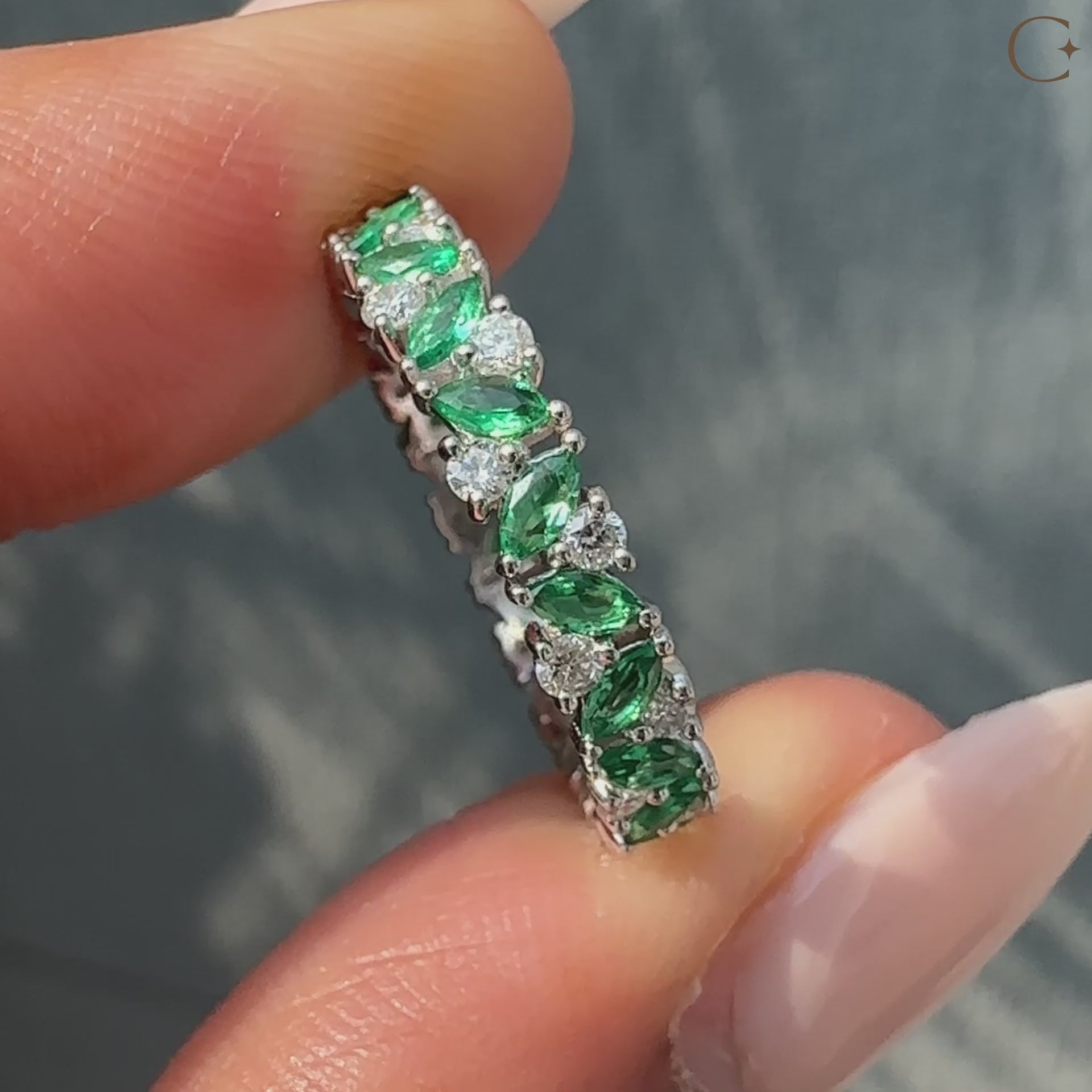 Round and marquise diamond wedding band in a unique design.
