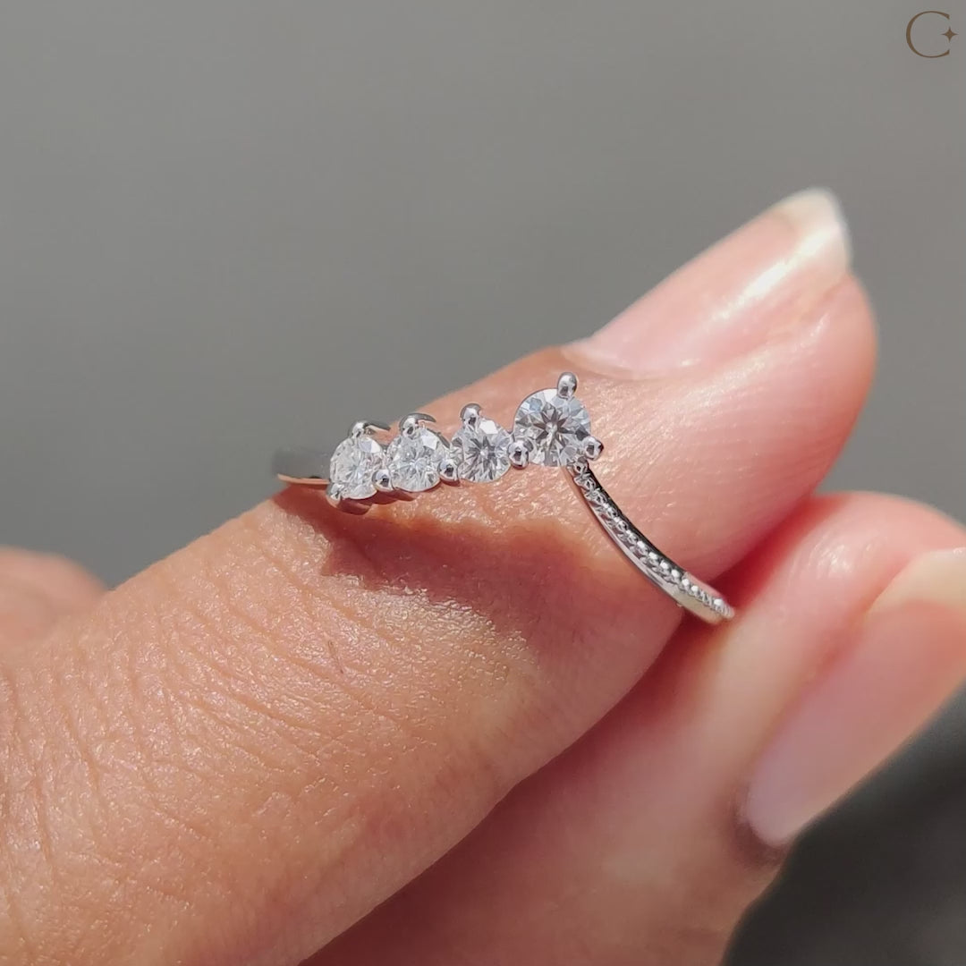 Round moissanite band designed with a vintage-style chevron pattern.
