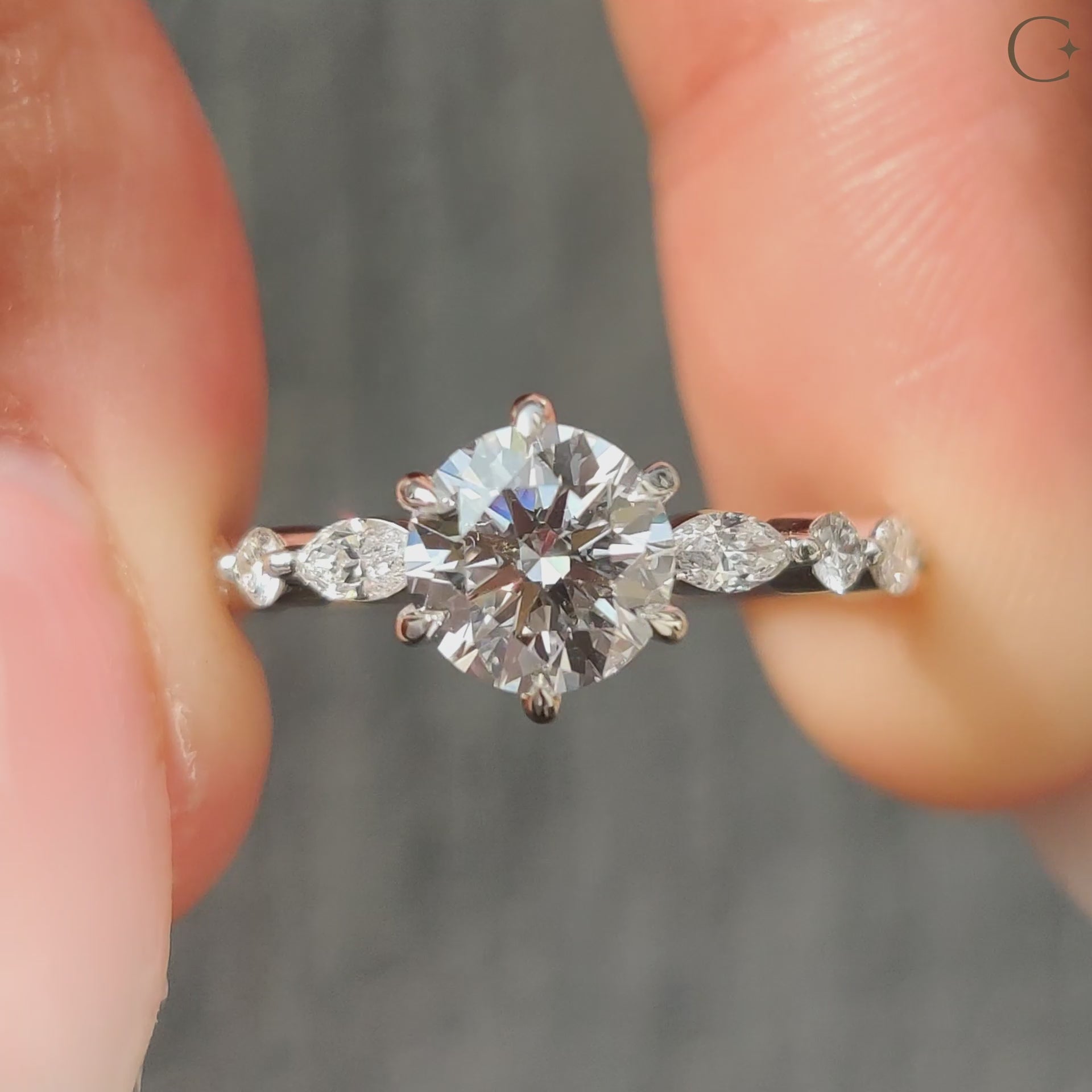 White gold round diamond ring featuring exquisite sparkle.
