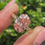 Pink Oval Diamond Ring with Nature Inspired Leaf and Floral Details