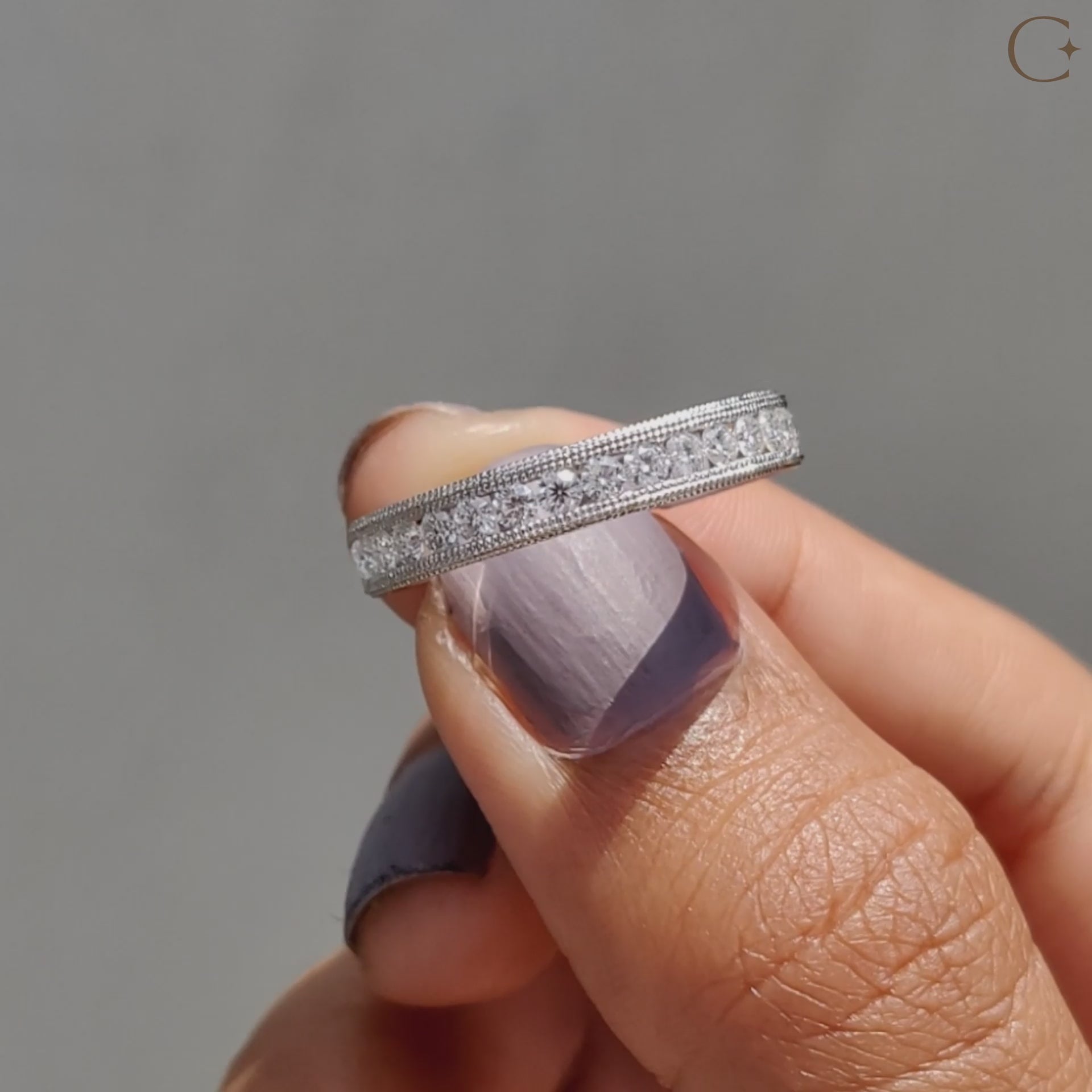Antique Art Deco wedding band with intricate patterns and handcrafted accents for timeless appeal.