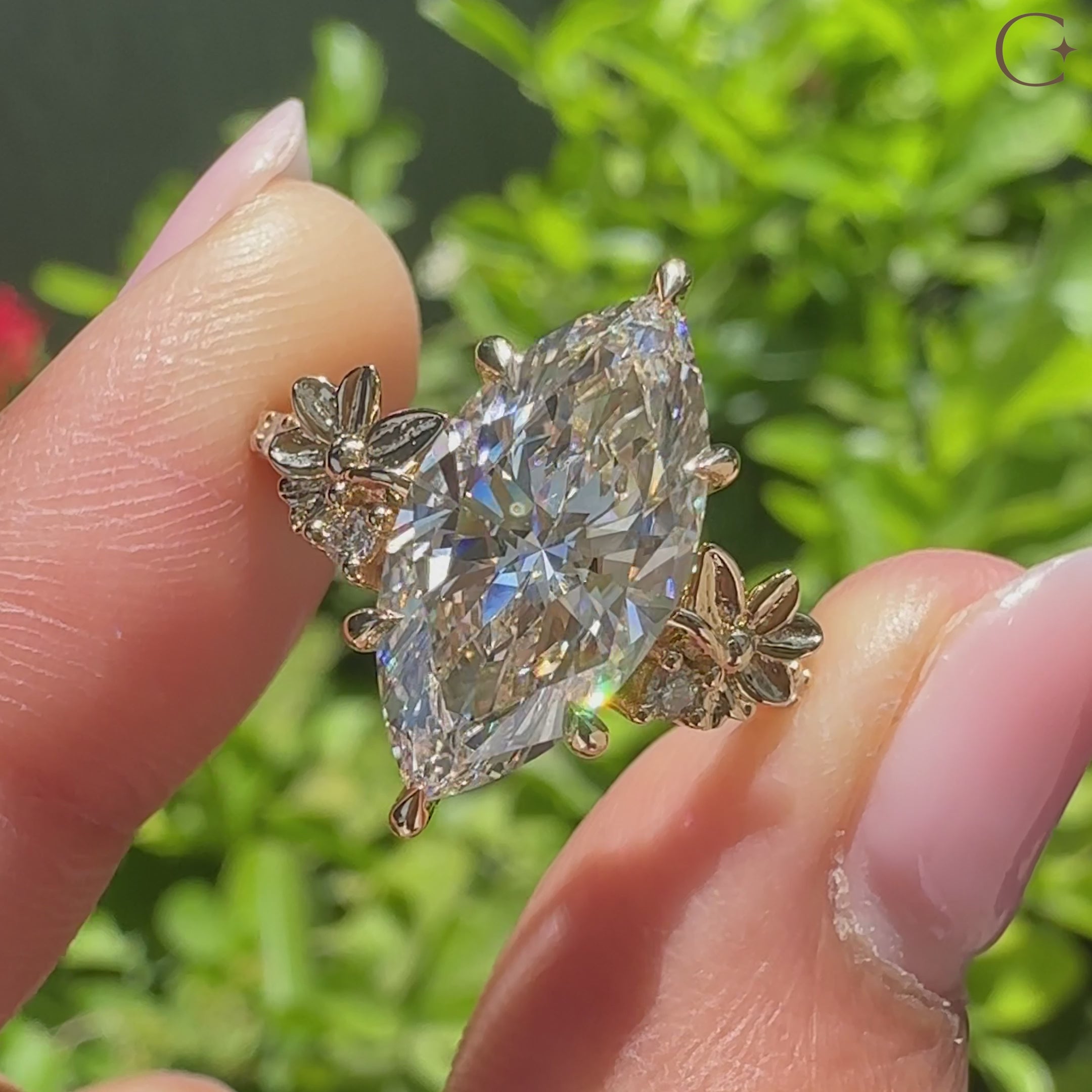 Nature inspired marquise diamond ring with flower design details
