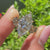 Nature inspired marquise diamond ring with flower design details
