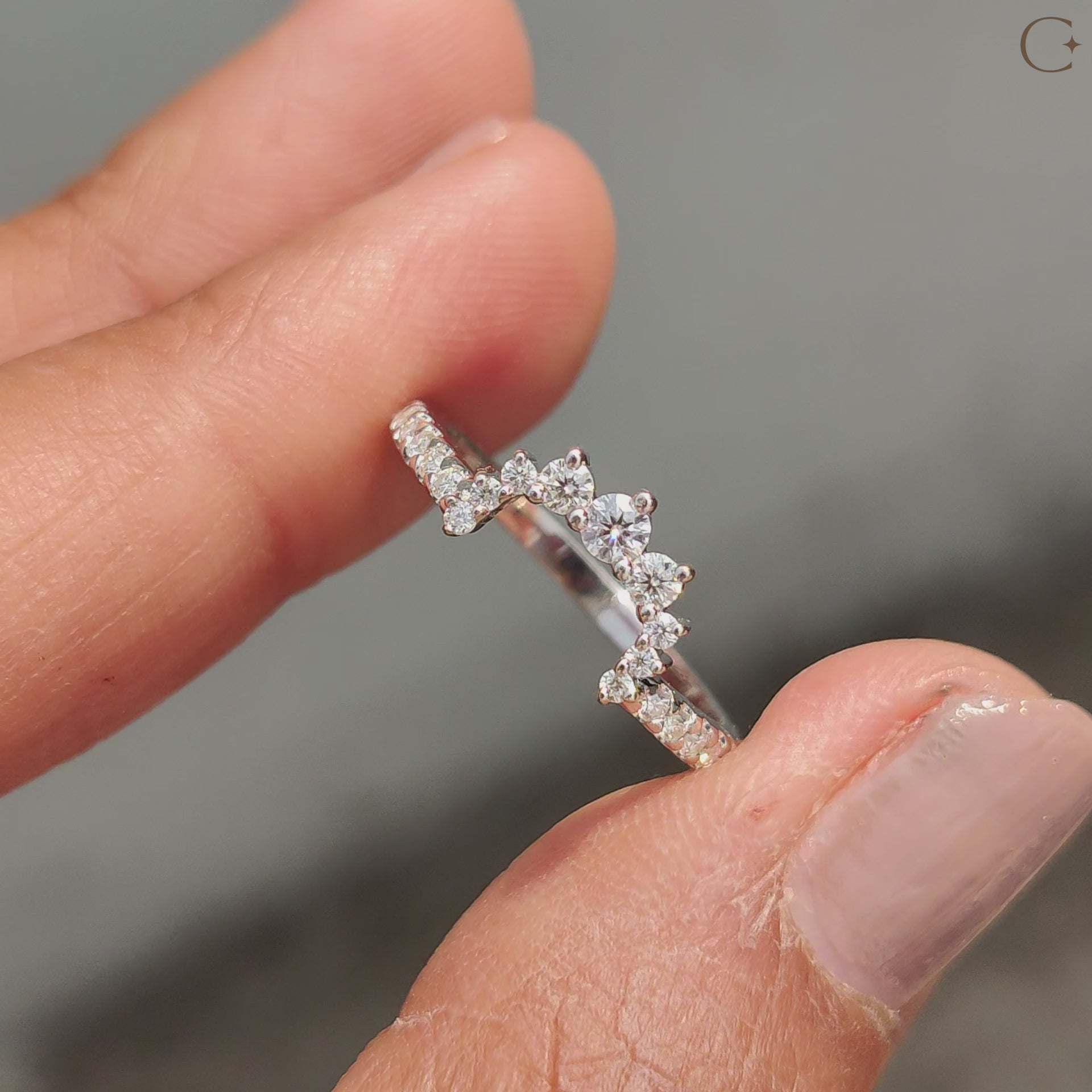 Elegant round cut wedding band featuring a delicate double row chevron band pattern.
