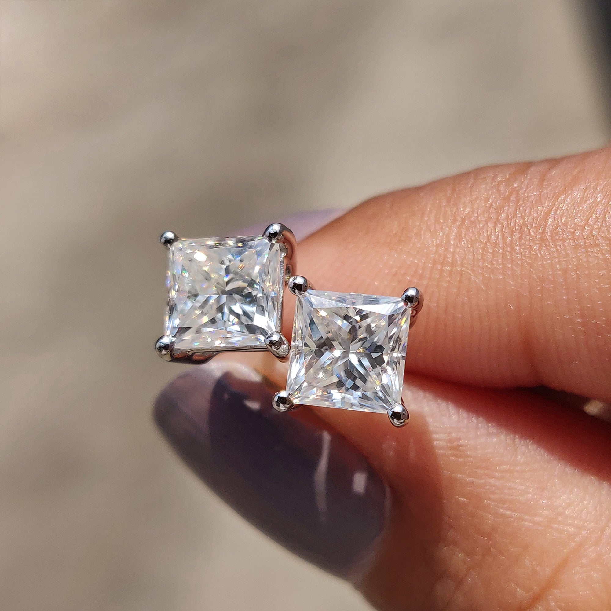 4 prong setting used for Princess Cut stud earrings in Moissanite Earrings collection.
