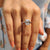 This emerald engagement ring has a beautiful design.