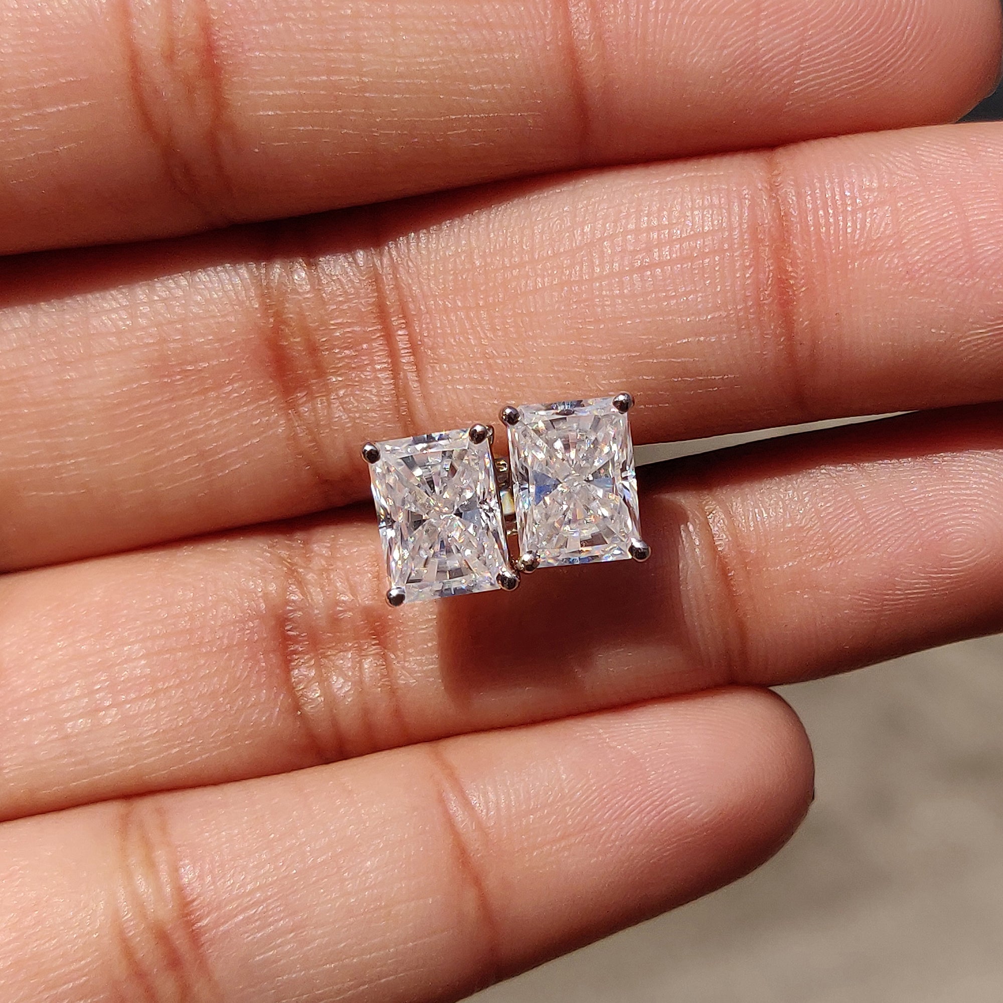 Women unique wedding gifts with radiant Cut stud earrings and custom earrings design.
