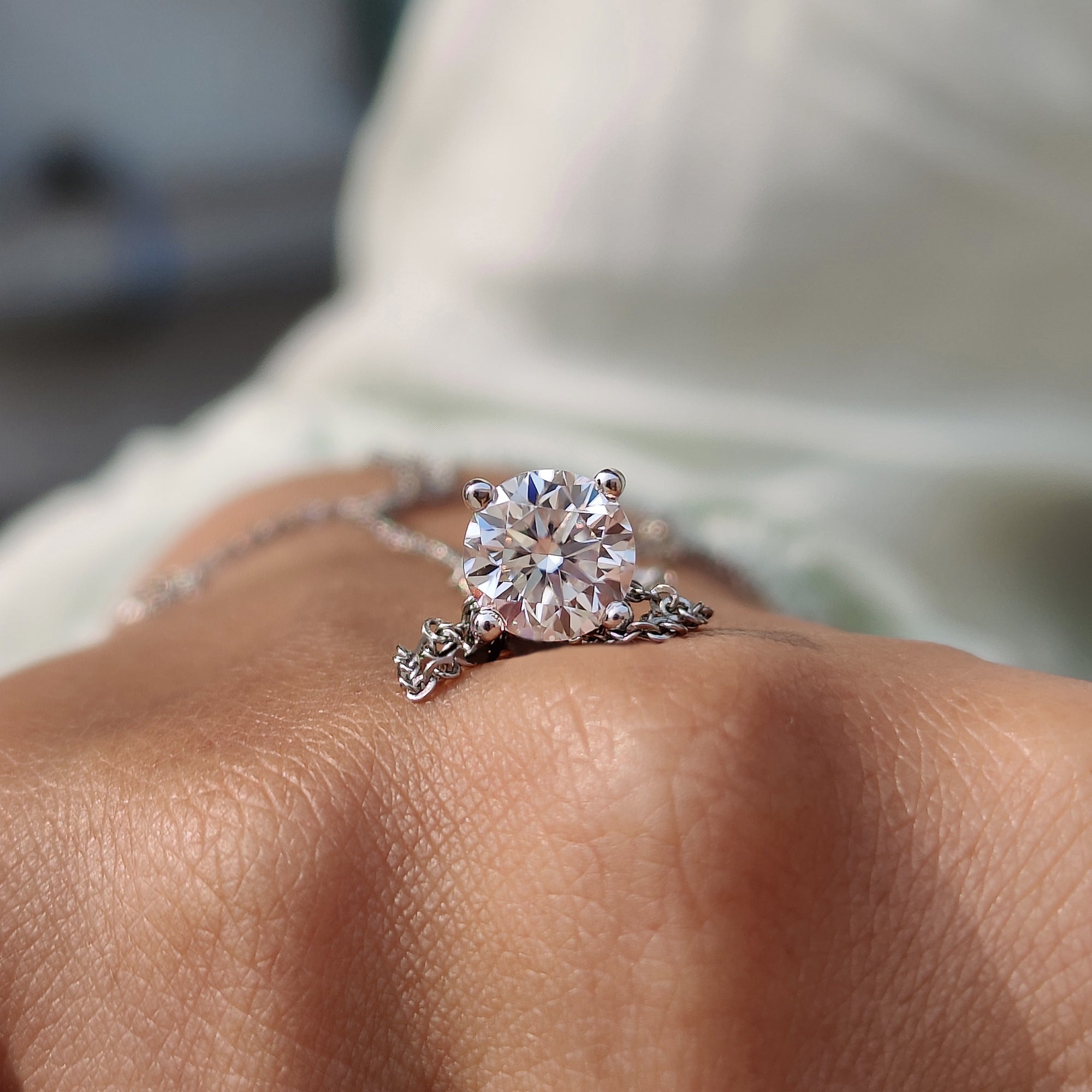 Pendant for women styled as a round Cut Wedding pendant with custom moissanite pendant.
