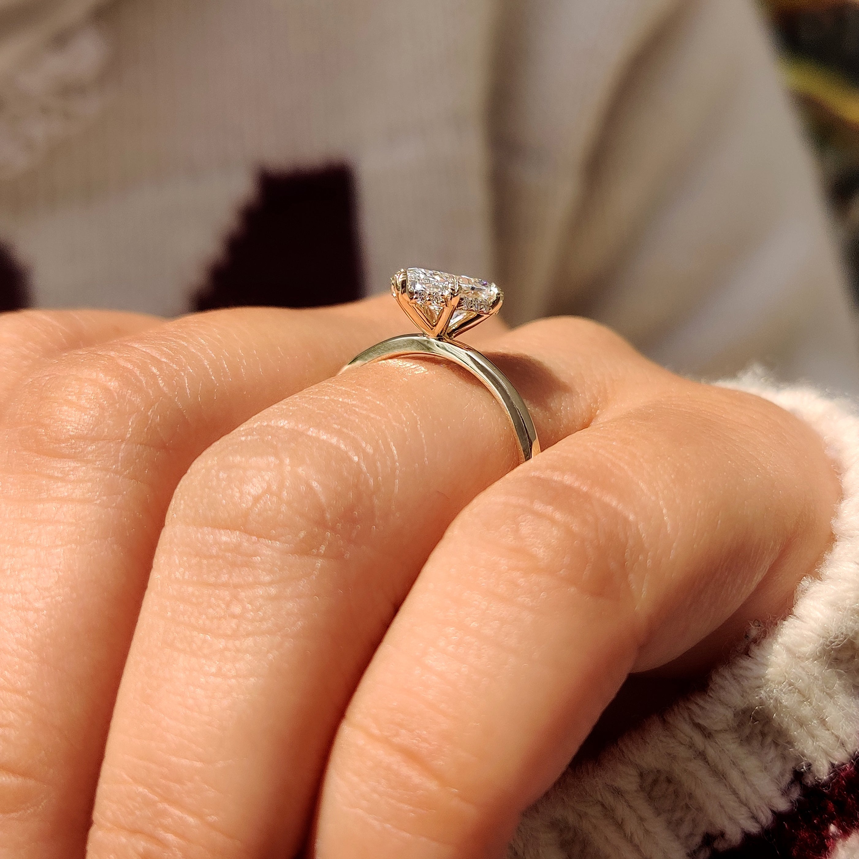 Handmade pear diamond ring with solitaire setting style.
