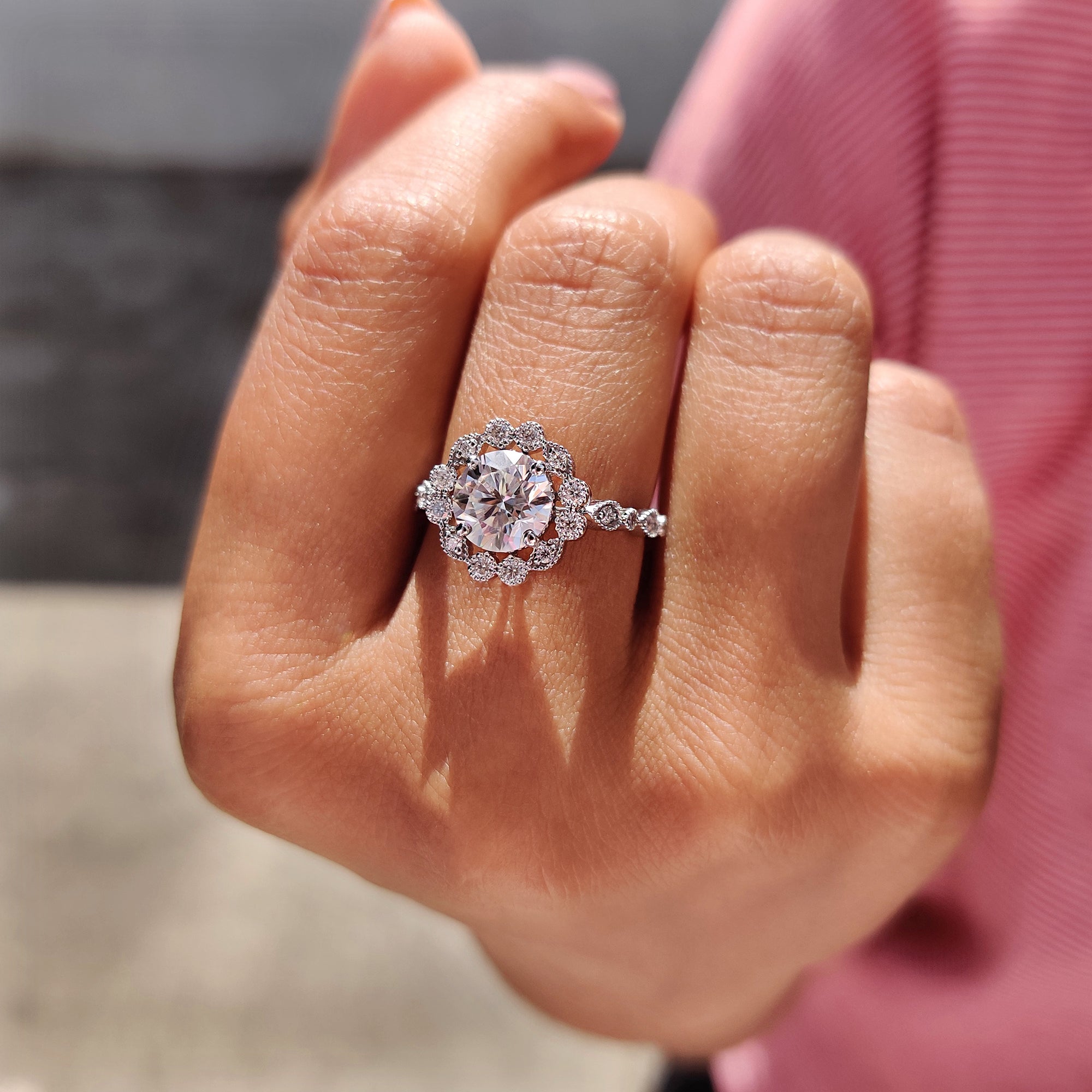 Prong setting ring showcasing a brilliant moissanite.
