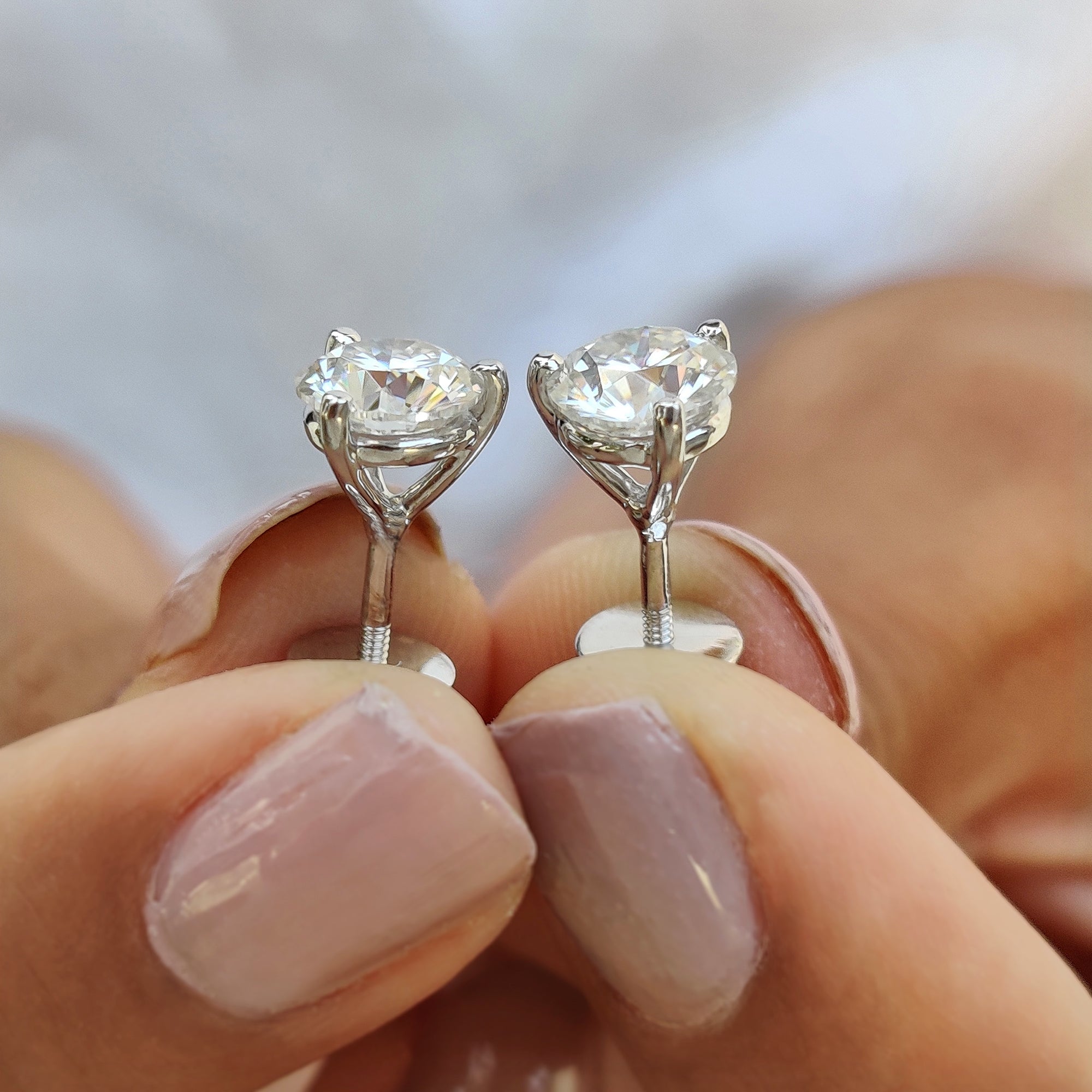 Round stud cut earrings made with Stud Earrings design and handmade jewelry finish.
