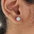 White gold earrings paired with 3 prong setting and stud earrings style.
