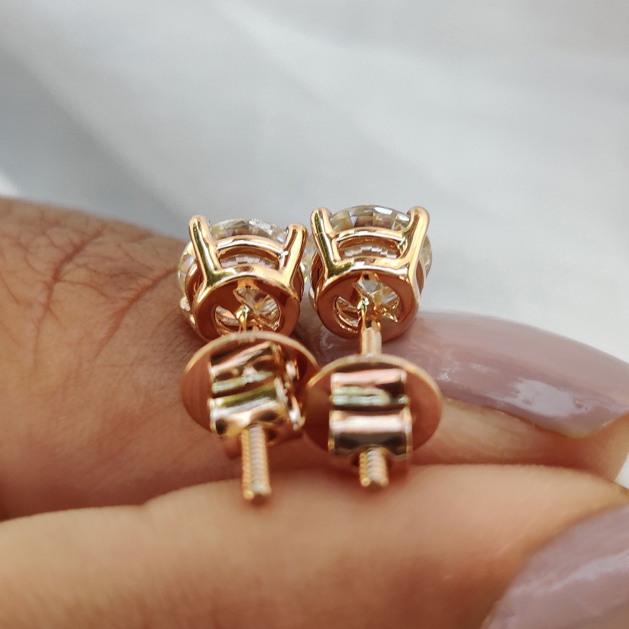 Gold earrings paired with round cut earrings for Everyday Earrings and birthday gifts for her.
