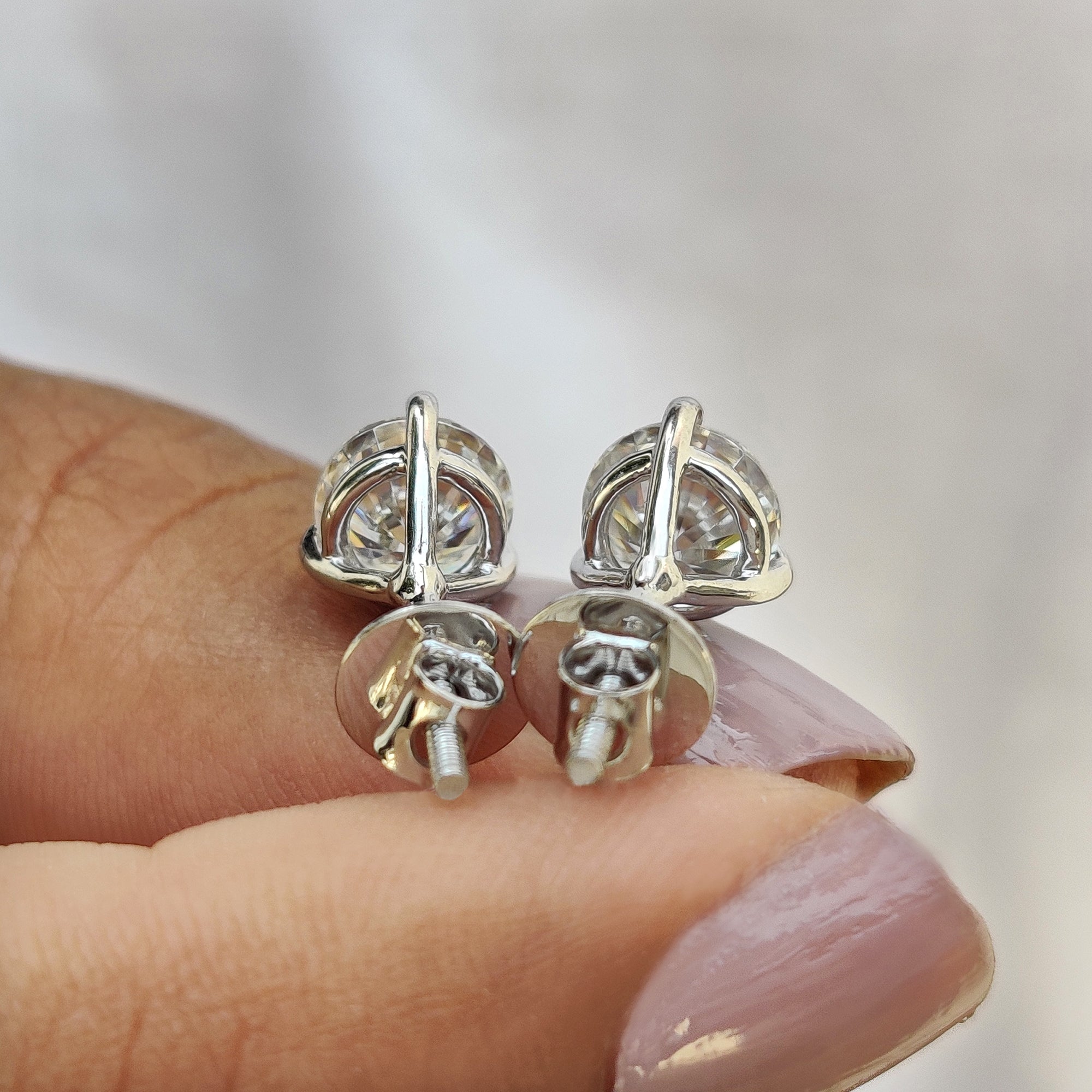 Stud Earrings in martini style crafted with Moissanite Earrings and screw back earrings.
