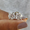 Round cut Moissanite Earrings crafted with 4 prong setting and white gold earrings for secure fit.
