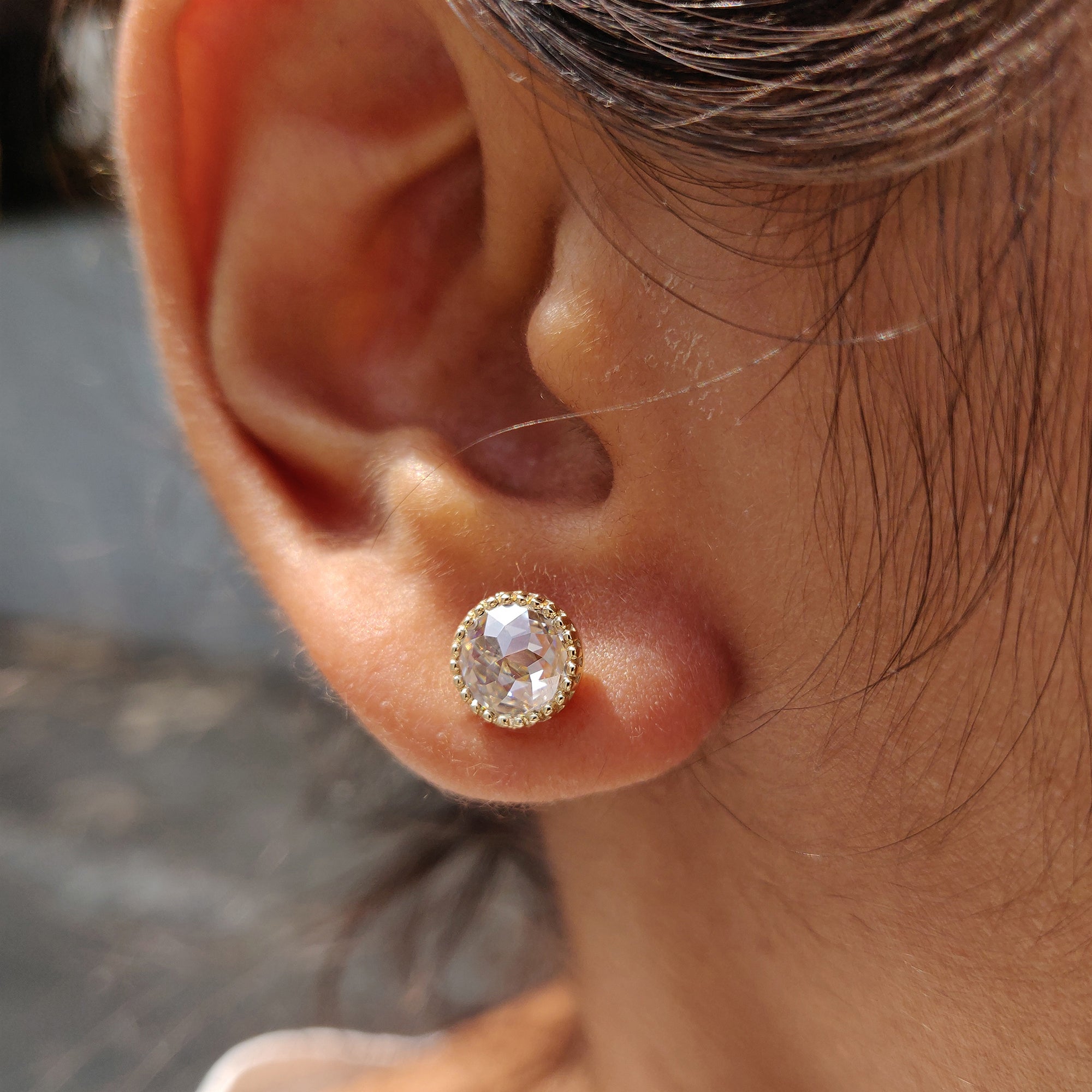 Milgrain earrings made with round rose cut stud earrings and yellow gold earrings.
