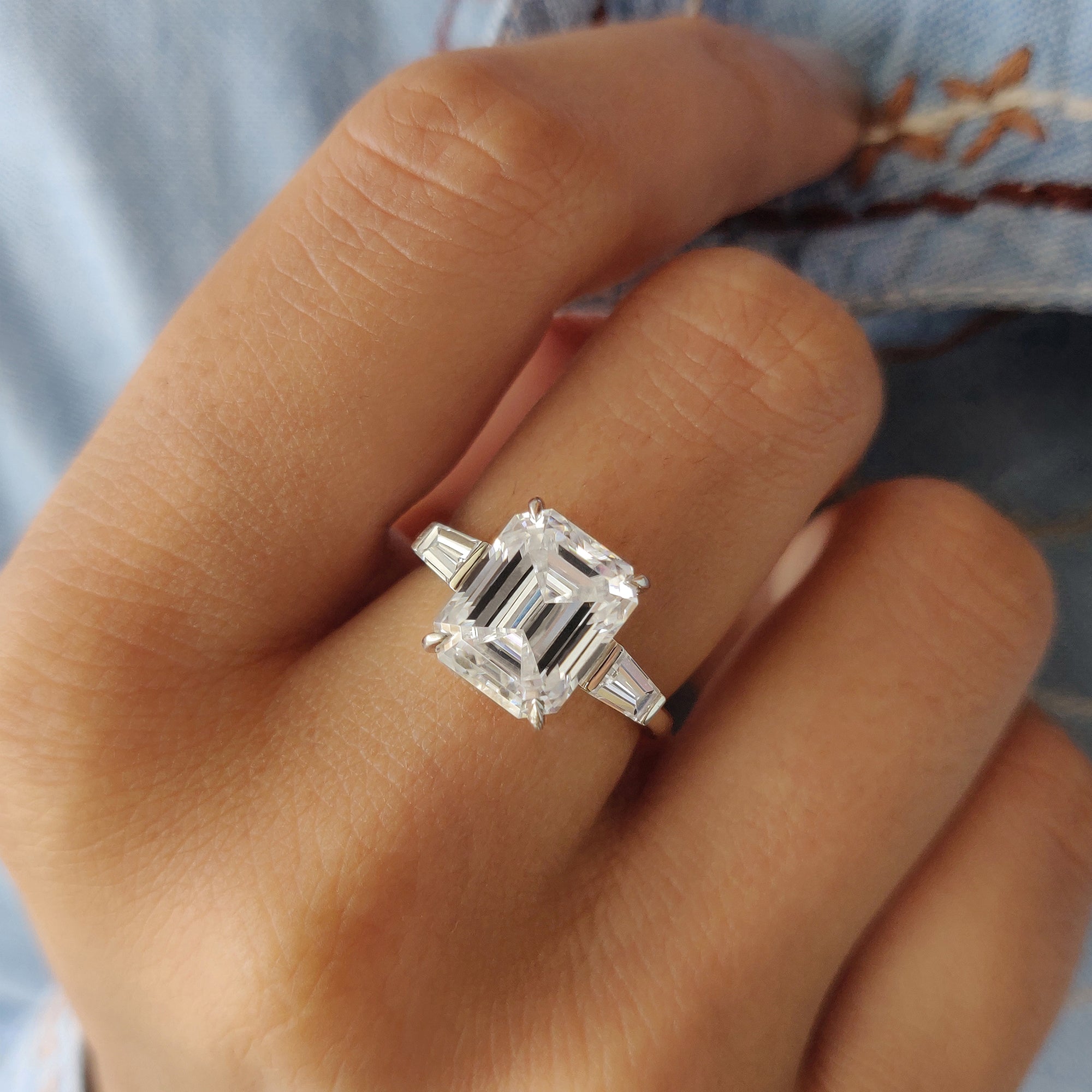The 3 stone moissanite ring adds timeless beauty and significance.