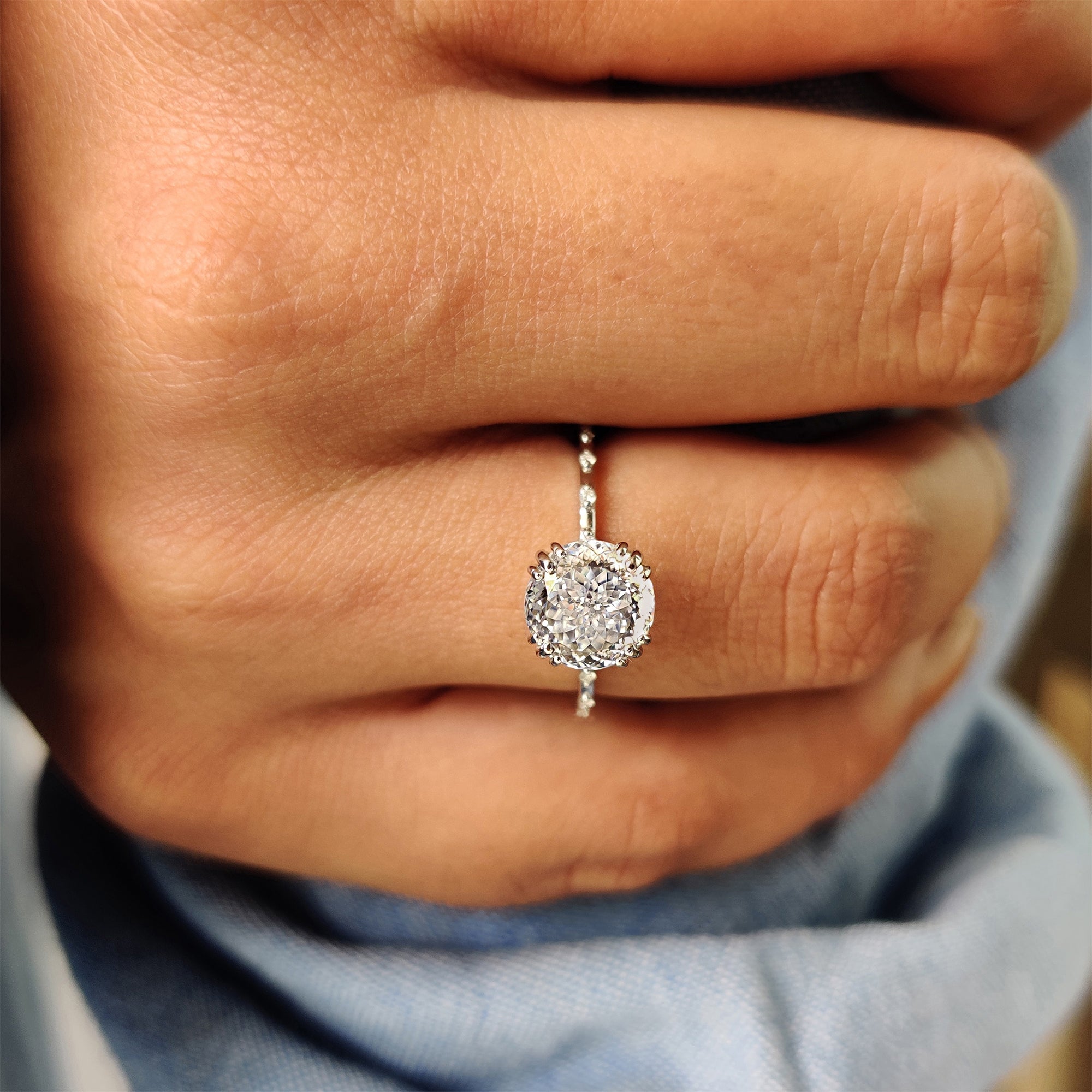 A fishtail prong engagement ring offers a vintage-inspired charm.
