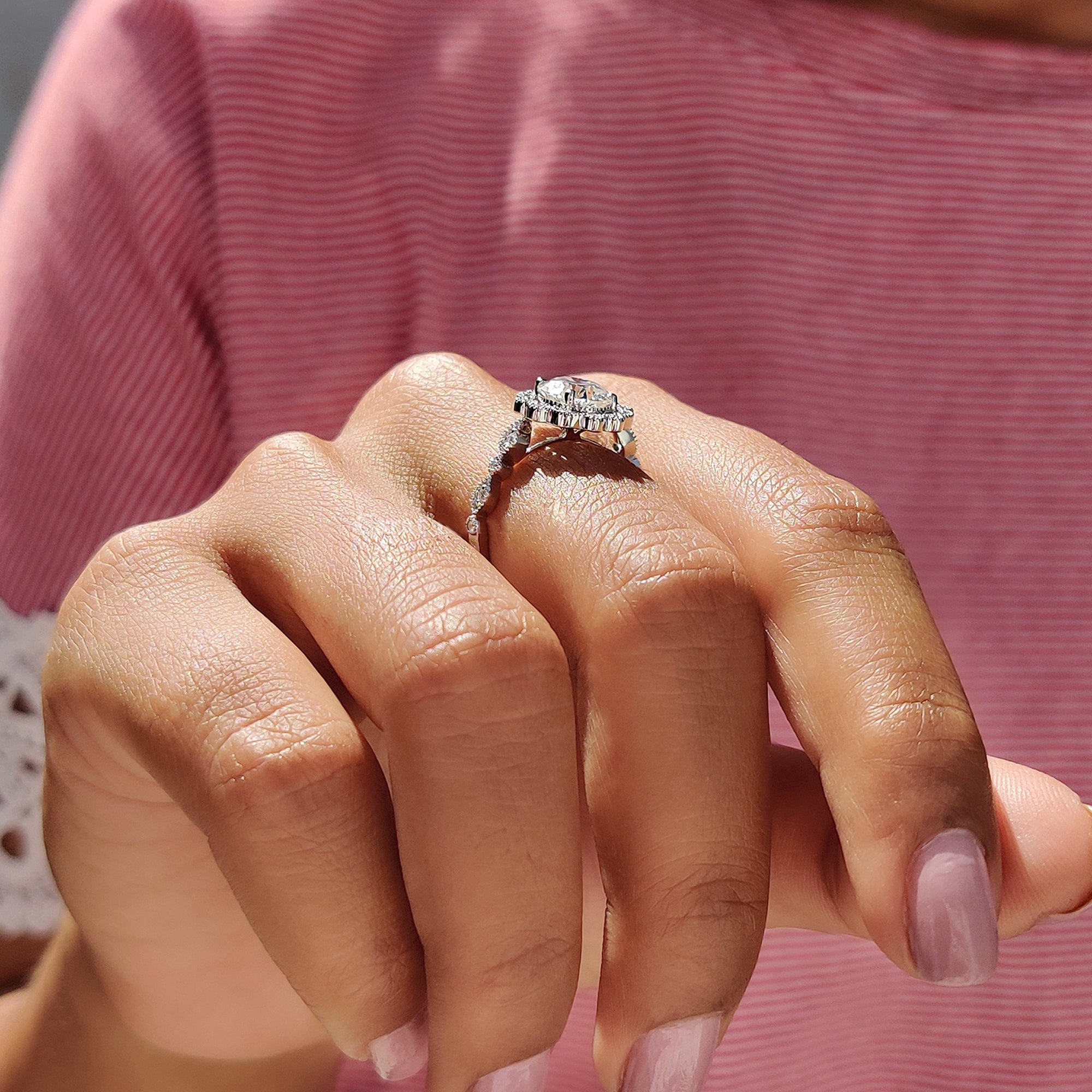 Custom engagement ring designed with moissanite.
